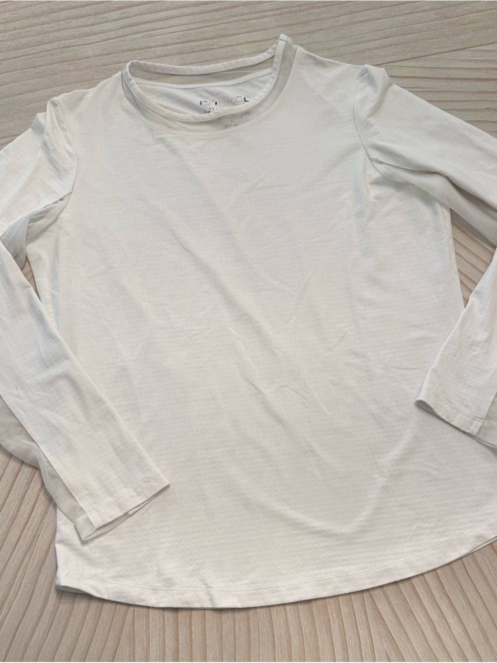 IBKUL Women’s White Long Sleeve Performance Tee
